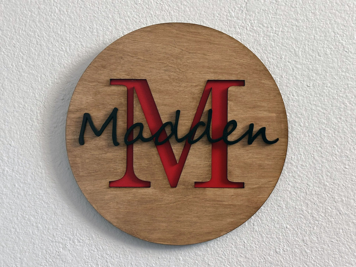Custom monogram sign with name overlay. Variety of colors and wood stain options to choose from. Makes a great gift for friends, loved ones, teacher appreciation. Approximately 11.75" in diameter. Handmade by Space Rubber Ducky Designs.