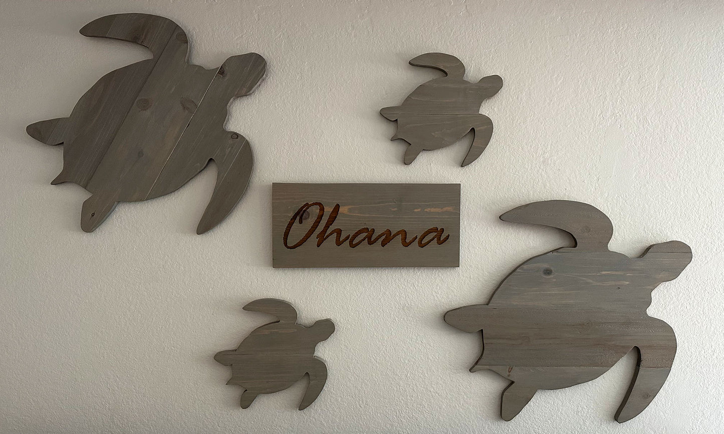 Custom handmade wood turtle wall art. Set of 4 turtles includes a board with Ohana laser engraved. Each piece includes mounting brackets and wall anchors.