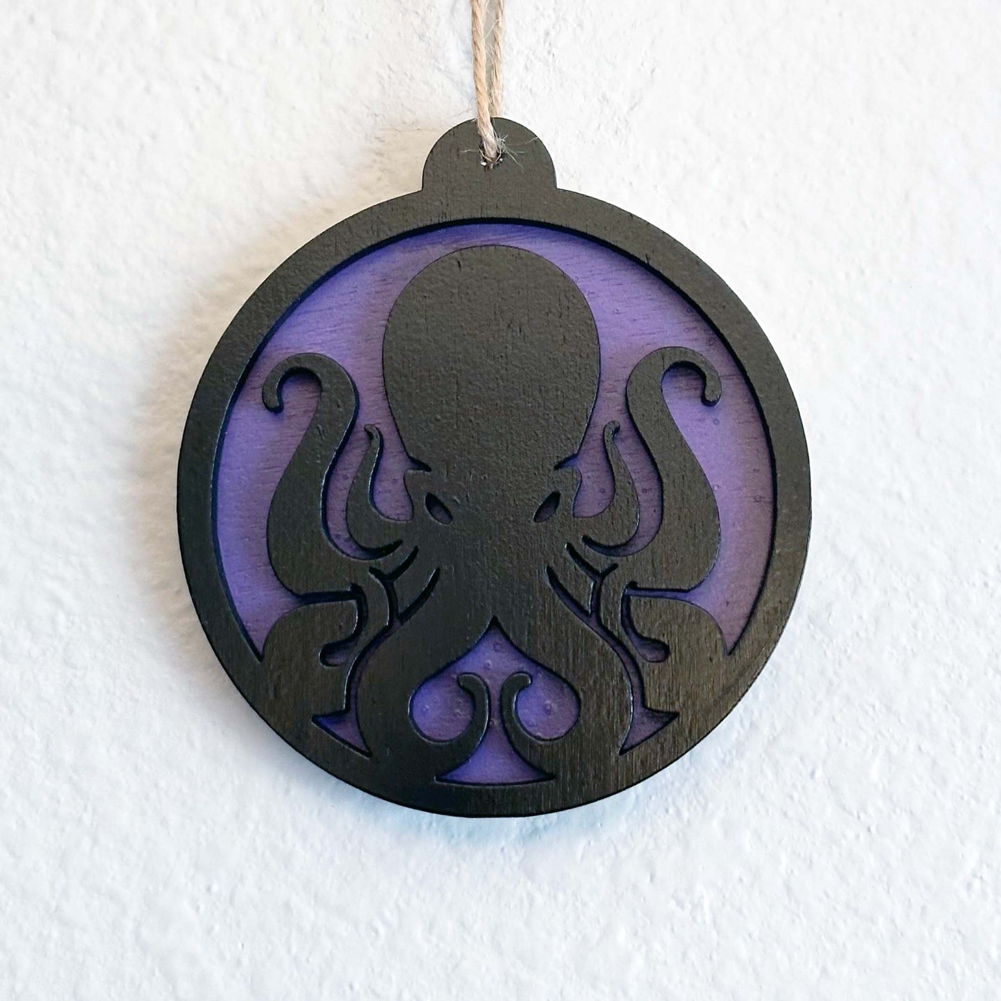 Handmade wood Christmas ornaments. Beach, turtle, Hawaiian, octopus, sports, patriotic, pop culture, Star Wars, and Marvel themed. And there's donuts! Variety of color options available. Custom and personalization options. Made by Space Rubber Ducky Designs in the USA.