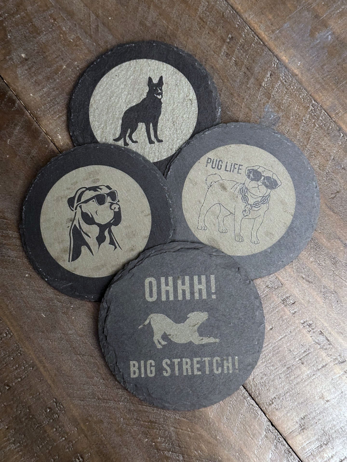 Are you all about that pug life? Do you have a resting pit face? Or maybe you're more of a spaced out shepherd? What about some BIG STRETCHES!? There's a dog to match every vibe! The perfect stocking stuffer, groomsman or house warming gift. These slate coasters will be right at home in any man cave or she shed.
