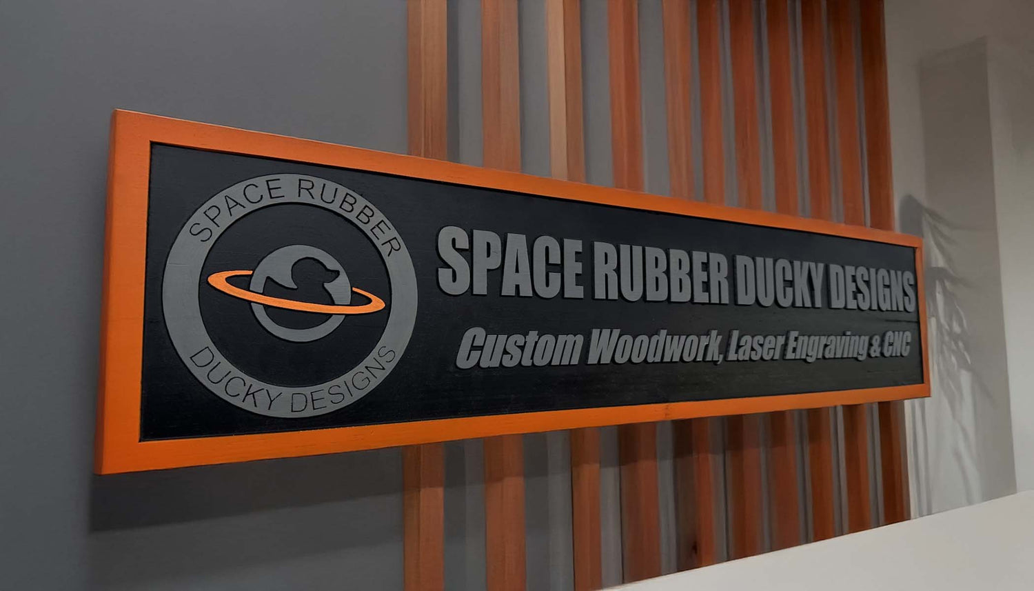 Custom wood sign with business logo and slogan. Carved from a single wood board for a 3D effect.