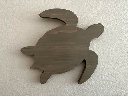 Custom handmade wood turtle wall art.  Set of 4 turtles includes a board with Ohana laser engraved.  Each piece includes mounting brackets and wall anchors.