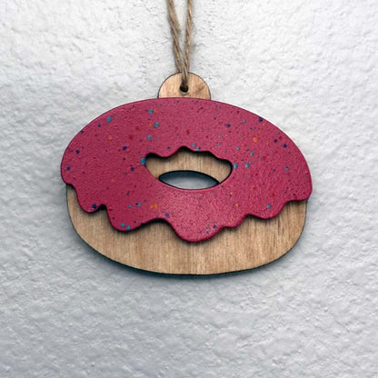Handmade wood Christmas ornaments. Beach, turtle, Hawaiian, octopus, sports, patriotic, pop culture, Star Wars, and Marvel themed. And there's donuts! Variety of color options available. Custom and personalization options. Made by Space Rubber Ducky Designs in the USA.