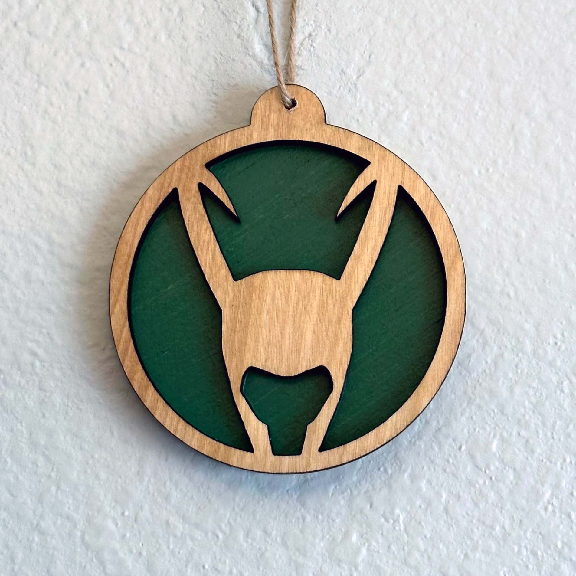 Handmade wood Christmas ornaments. Beach, turtle, Hawaiian, octopus, sports, patriotic, pop culture, Star Wars, and Marvel themed. And there's donuts! Variety of color options available. Custom and personalization options. Made by Space Rubber Ducky Designs in the USA.