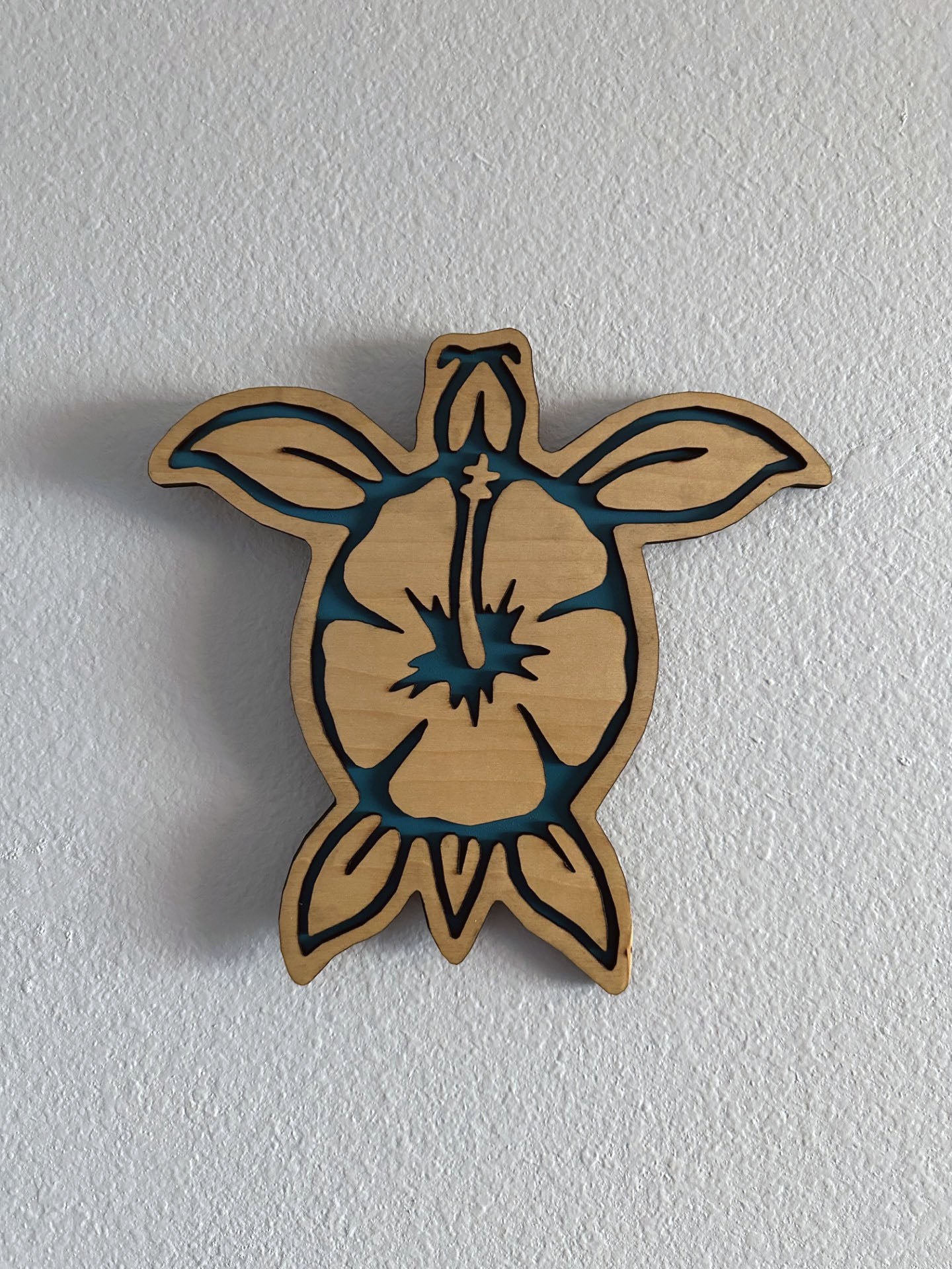 Brighten up your living space with some colorful turtle decor! Each piece of wall art features a sea turtle with hibiscus flower and an inlay color. Variety of colors and wood stains. A thoughtful gift for friends, loved ones, teacher appreciation! Handmade by Space Rubber Ducky Designs in Southern California, USA.