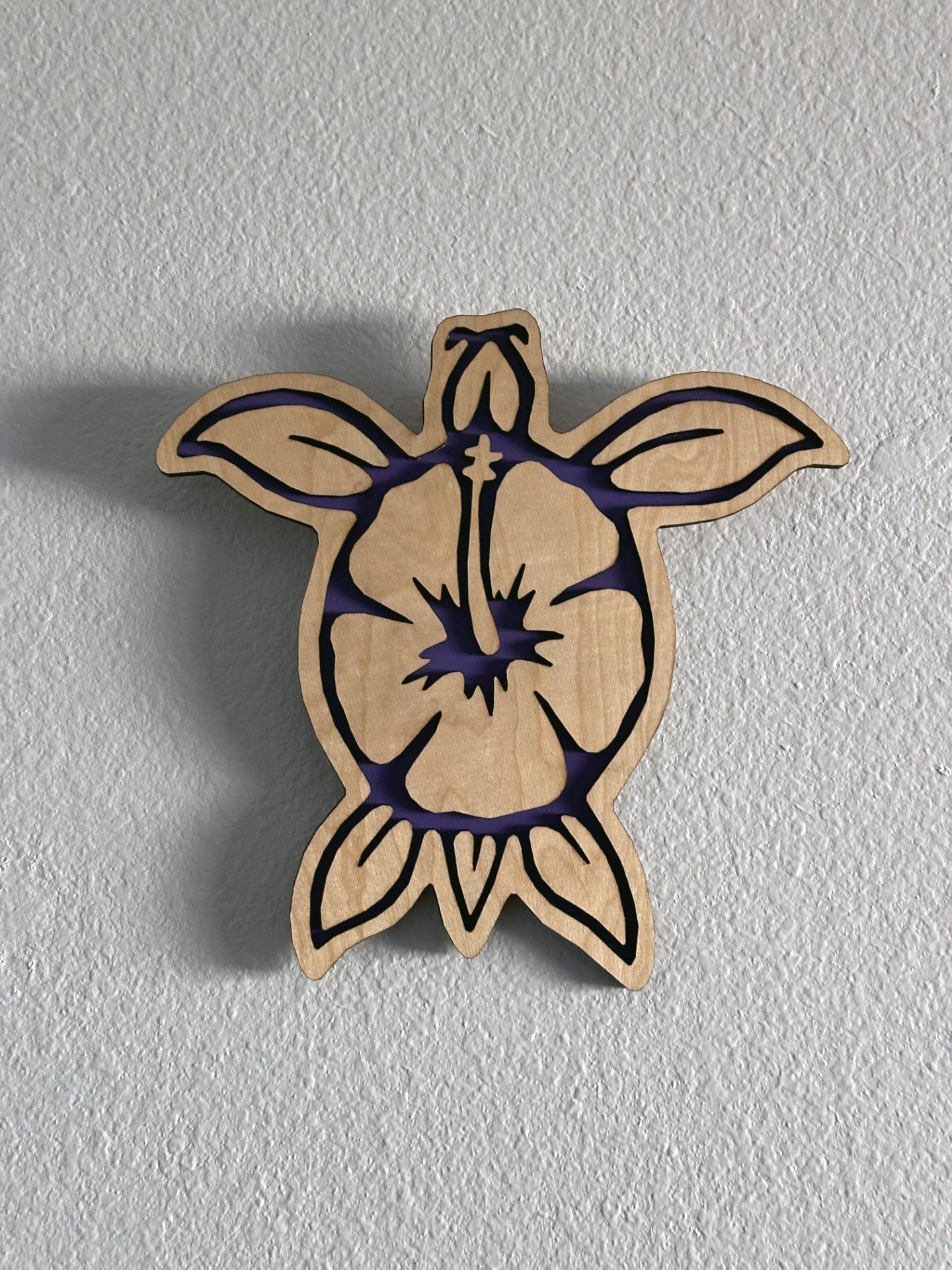 Brighten up your living space with some colorful turtle decor! Each piece of wall art features a sea turtle with hibiscus flower and an inlay color. Variety of colors and wood stains. A thoughtful gift for friends, loved ones, teacher appreciation! Handmade by Space Rubber Ducky Designs in Southern California, USA.