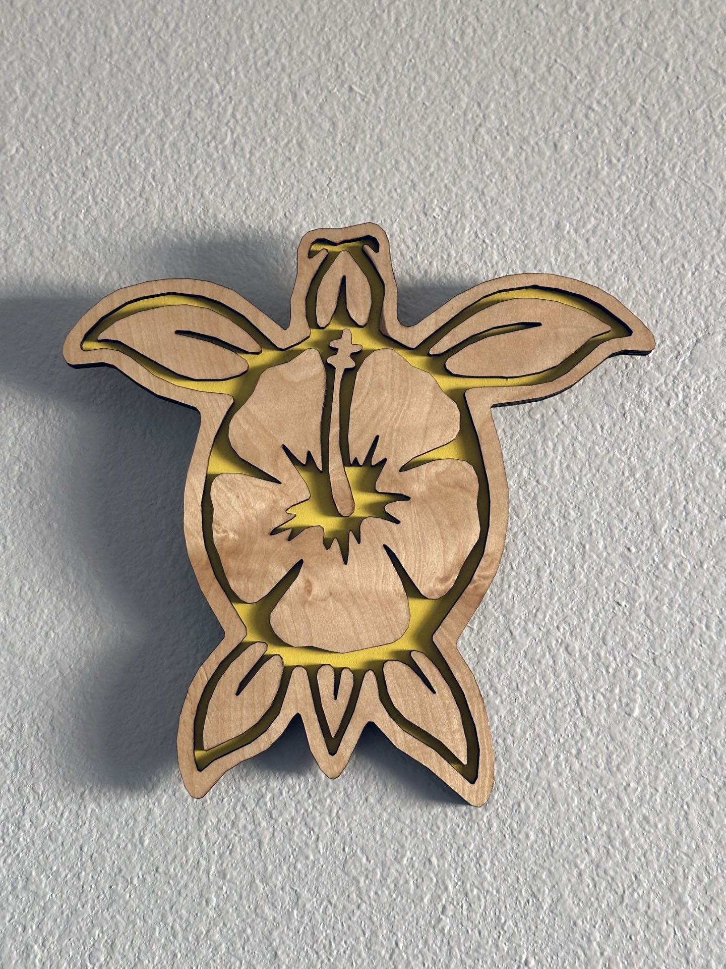 Brighten up your living space with some colorful turtle decor! Each piece of wall art features a sea turtle with hibiscus flower and an inlay color. Variety of colors and wood stains. A thoughtful gift for friends, loved ones, teacher appreciation! Handmade by Space Rubber Ducky Designs in Southern California, USA.