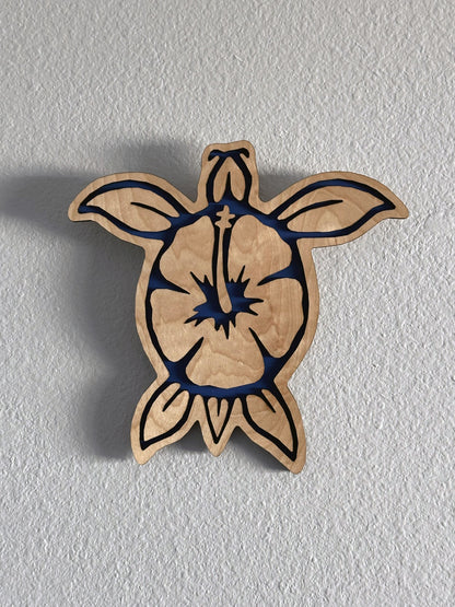 Brighten up your living space with some colorful turtle decor! Each piece of wall art features a sea turtle with hibiscus flower and an inlay color. Variety of colors and wood stains. A thoughtful gift for friends, loved ones, teacher appreciation! Handmade by Space Rubber Ducky Designs in Southern California, USA.