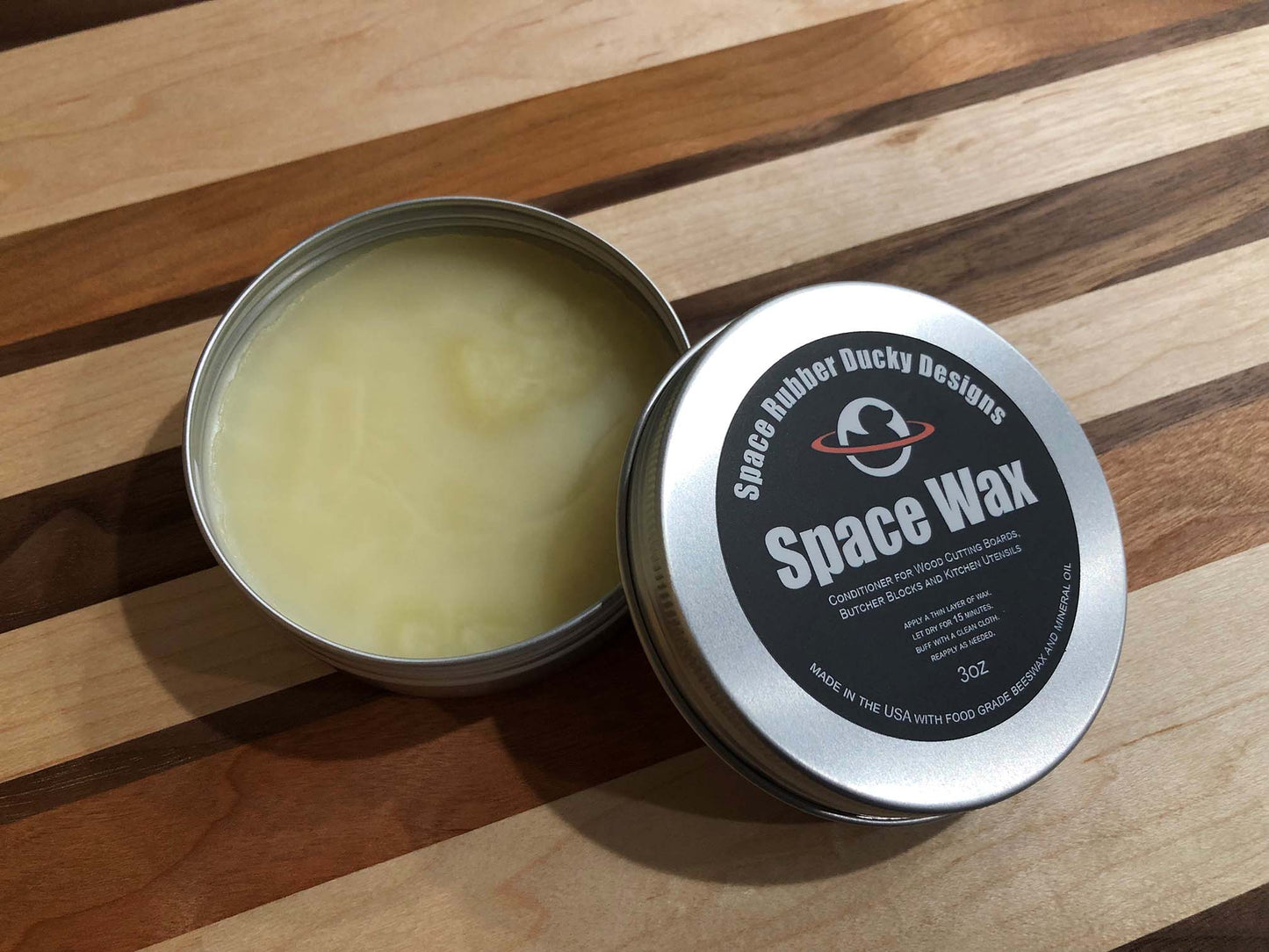 Space Wax wood conditioner, by Space Rubber Ducky Designs. Mineral oil and organic beeswax conditioner for cutting boards, butcher blocks, kitchen utensils and more!